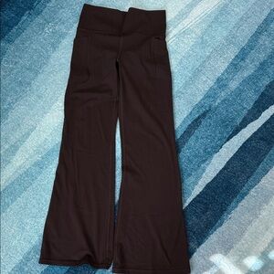 Athleta Black Salutation Stash Flare Pants with pockets